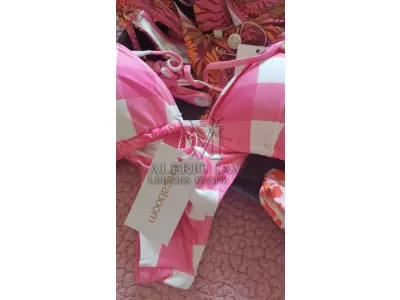 LOTE 317 - DIVERSAS PEÇAS DE ROUPAS